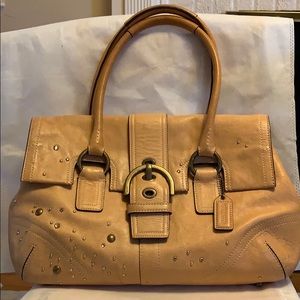 Coach leather bag with embellishments